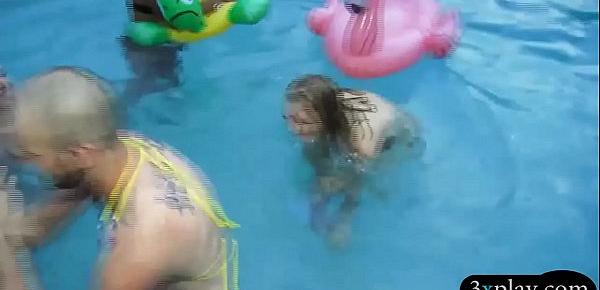  Two bikini girls sucking and fucking hard by the pool
